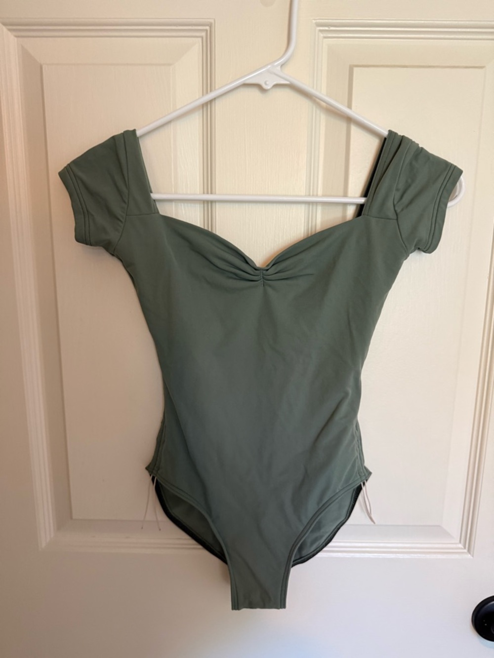 Nikolay Olive Green cap sleeve leotard with cinch hip, size 12/13